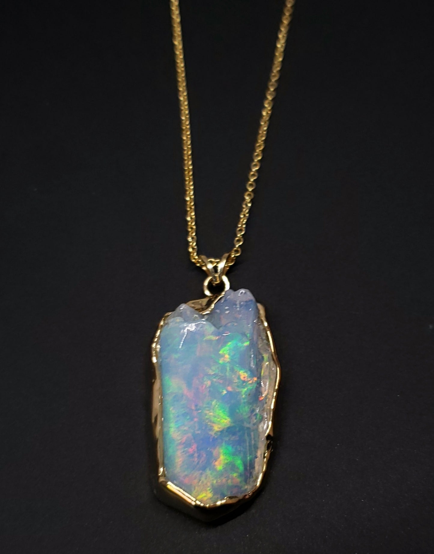 Carved Opal Gold Pendant