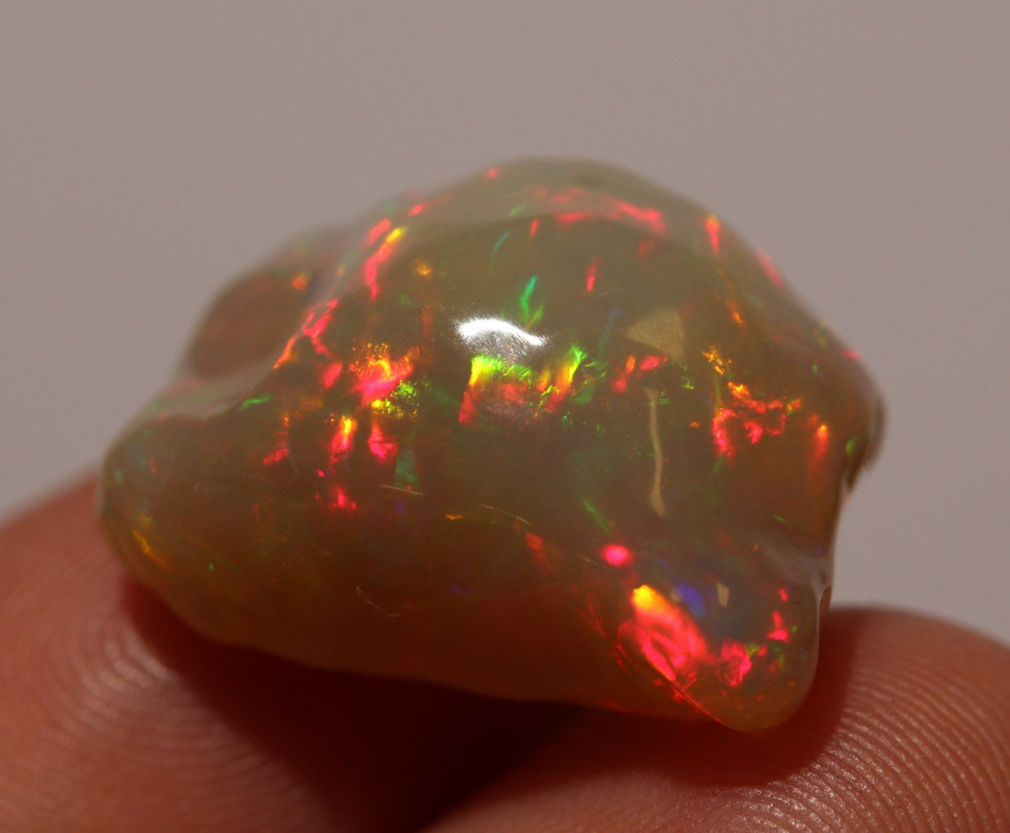 Carved Brown Opal - 14.5 Carat Bright Red Fire #1371