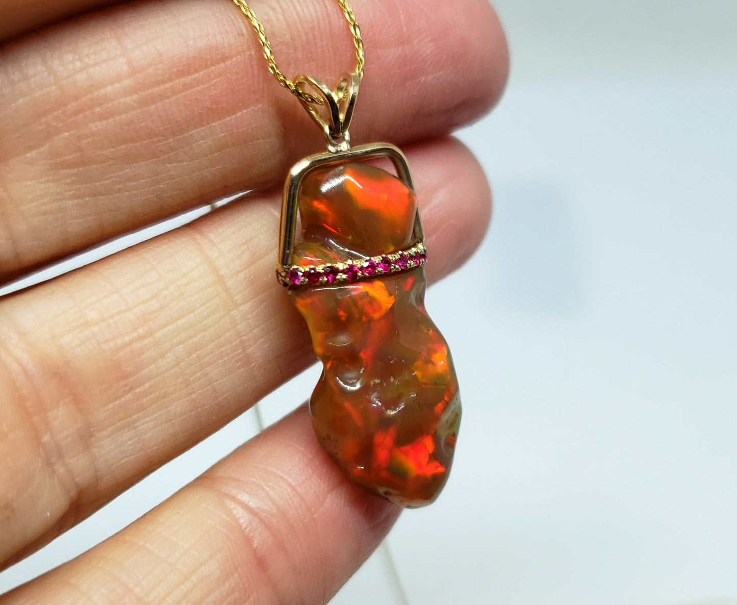 Red Carved Opal Pendant
